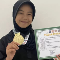 Debut Gemilang! Afifah Aprilia, Pesilat Muda Lamongan, Langsung Sabet Juara